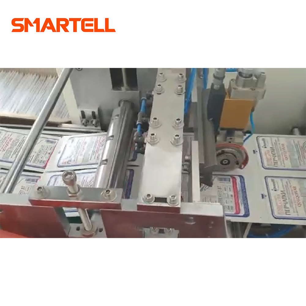 SMT-4140 Guantes de látex quirúrgicos completamente automáticos Máquina envasadora de bolsas exteriores de guantes de sellado de bolsas de papel